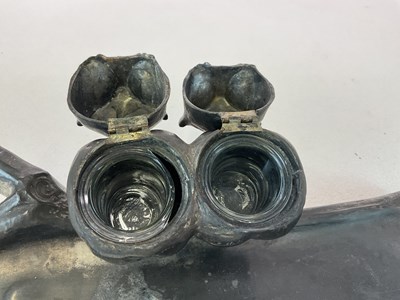 Lot 127 - A German pewter ink well, styled as owls...