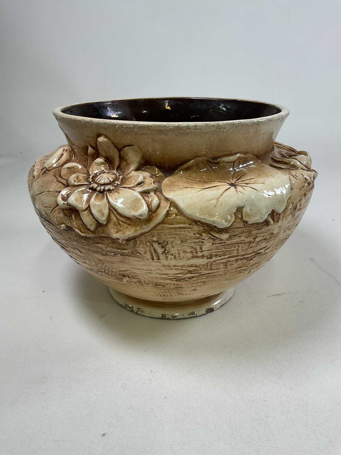 Lot 317 - BRETBY; a large floral design Bretby pot,...