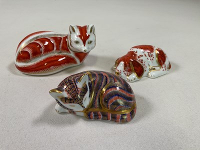 Lot 312 - ROYAL CROWN DERBY; three paperweights to...