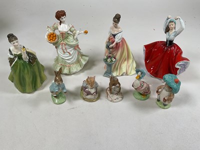 Lot 274 - ROYAL DOULTON; four figures of ladies and five...