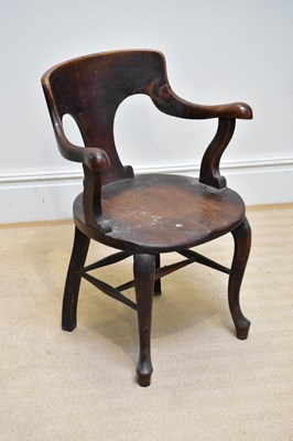 Lot 153 - An early 20th century stained beech desk chair,...