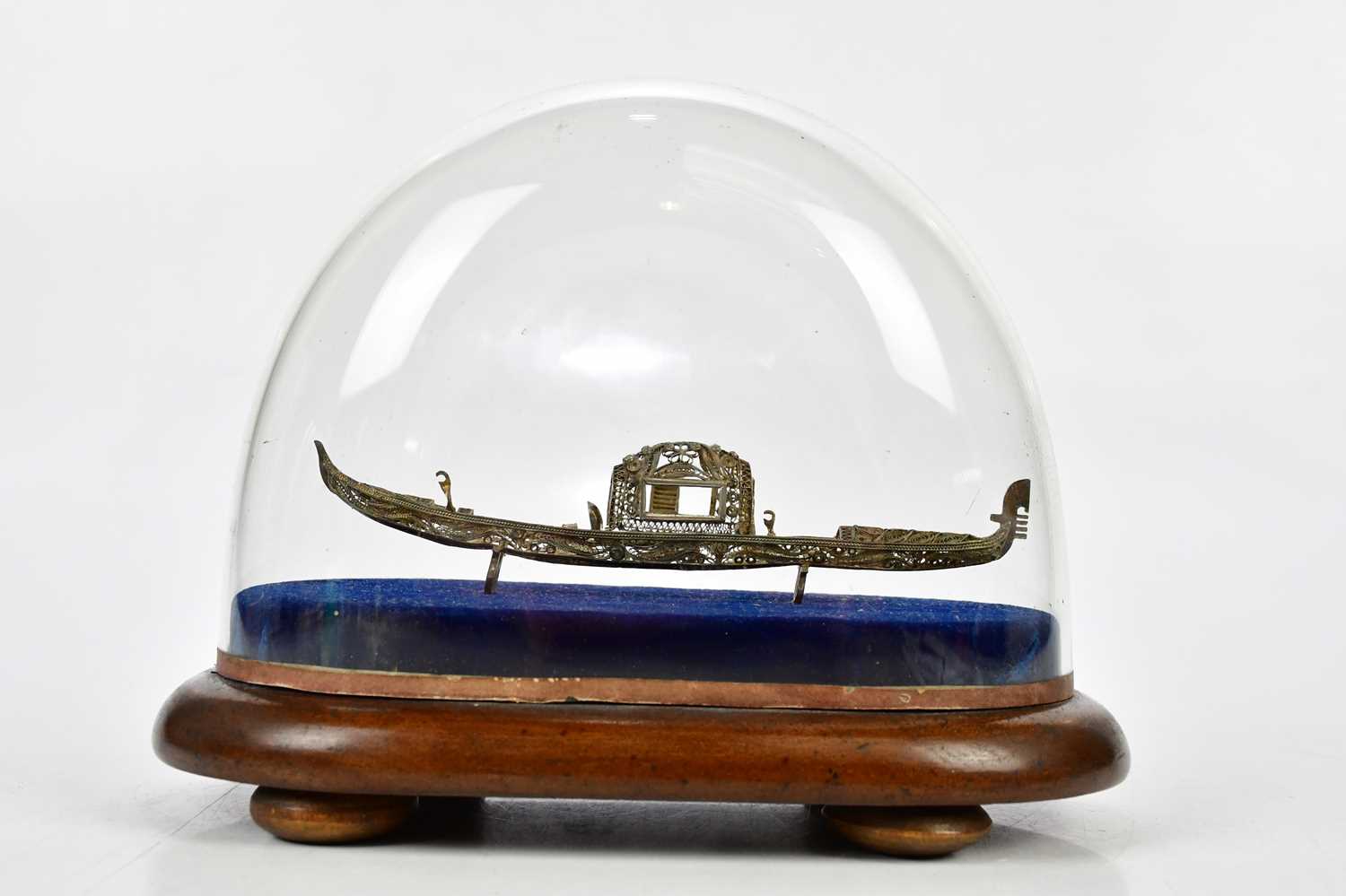 Lot 2179 - A white metal miniature model of a gondola, on...