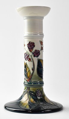 Lot 300 - MOORCROFT; a 'Brambles' pattern candlestick on...