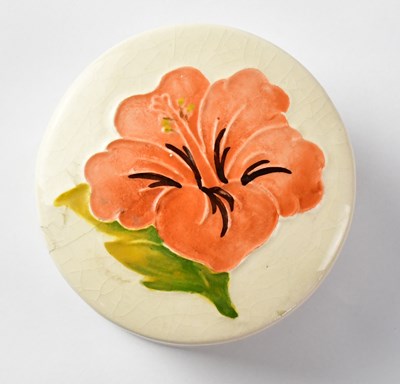 Lot 299 - MOORCROFT; a 'Hibiscus' pattern covered pin...