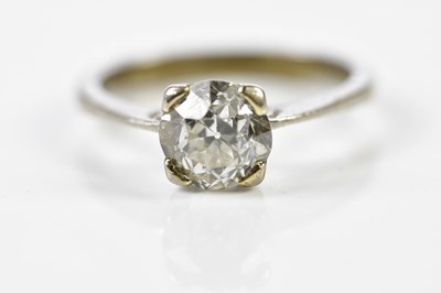 Lot 72 - An 18ct white gold diamond ring, the corner...