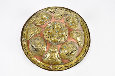 Lot 2570 - An Eastern copper and brass dahl type shield...