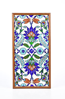 Lot 1322 - Two 20th century Iznik tiles with floral...