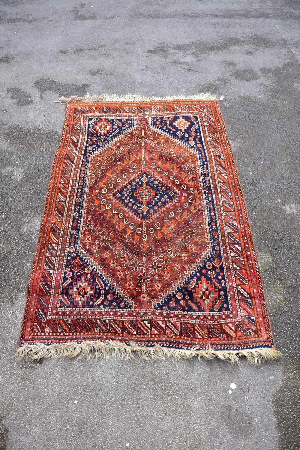 Eastern Rug Designs Lot 1202 - A large Eastern style rug with stylised