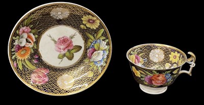 Lot 546 - SPODE; a porcelain teacup and saucer decorated...