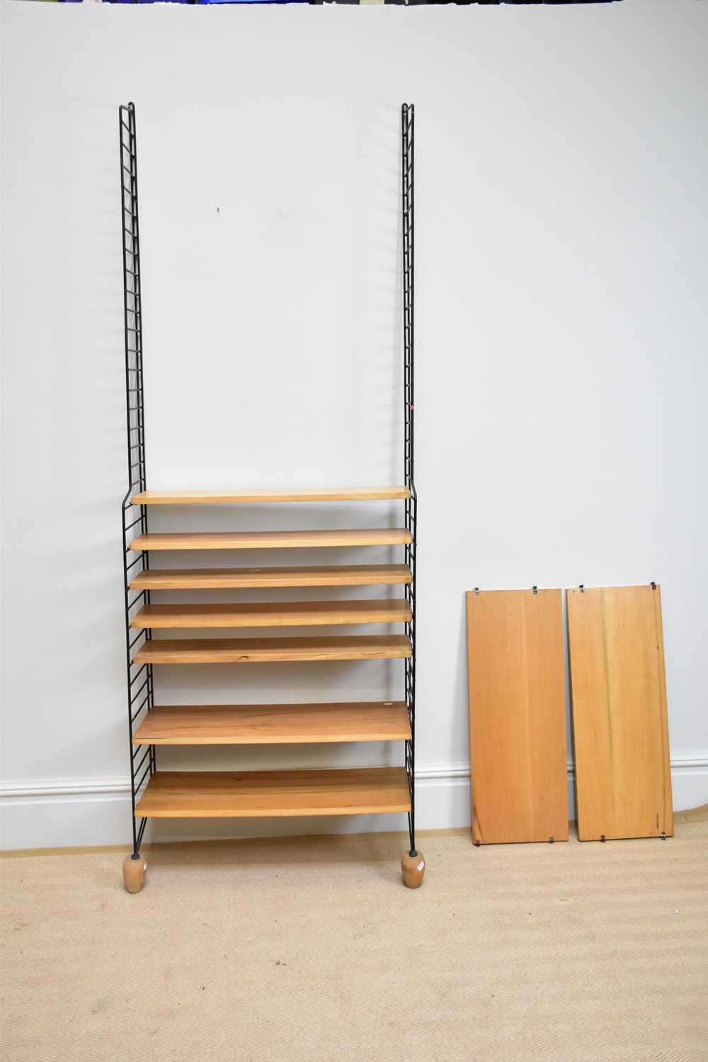 Lot 1161 - A mid century Ladderax type shelving system