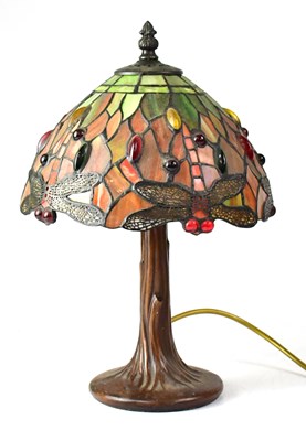 Lot 121 - A small Tiffany-style table lamp with leaded...