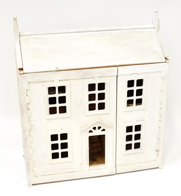 Lot 577 - A painted softwood two-storey dolls' house...