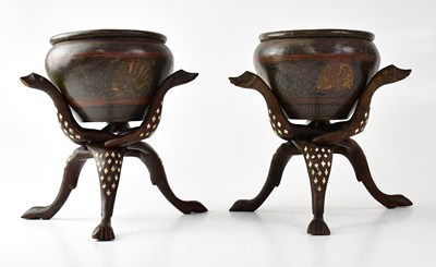 Lot 413 - A pair of Eastern bronze bowls with incised...