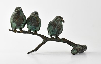 Lot 191 - A small bronze figure group of three birds on...