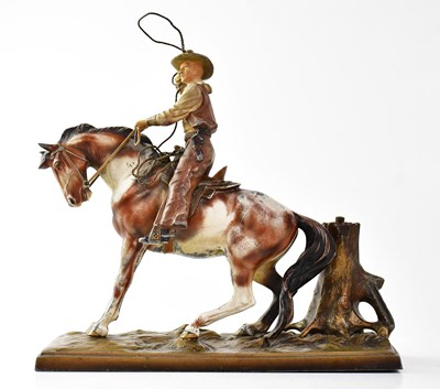 Lot 253 - An early 20th century painted spelter figural...