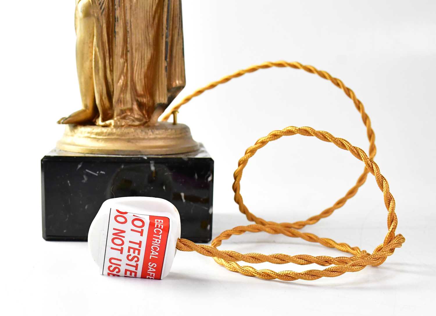 Lot 127 A painted spelter figural lamp base with