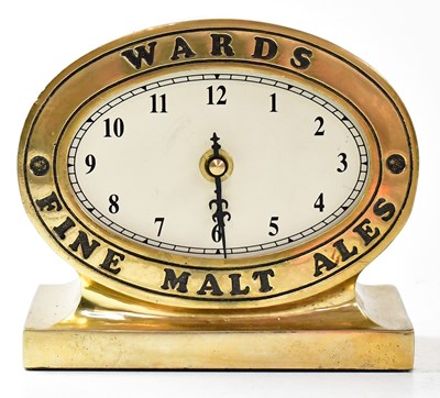 Lot 140 - A reproduction brass advertising clock for...
