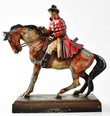 Lot 252 - An early 20th century painted spelter figural...