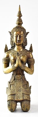 Lot 167 - A bronze figure of a Thai temple watcher in...