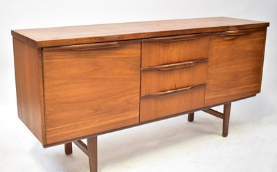 Lot 3 - A mid-20th century teak sideboard with three...