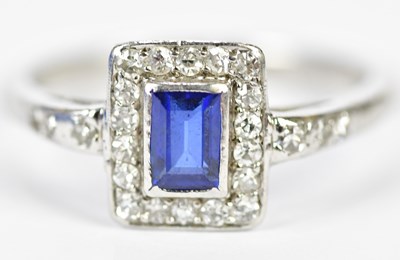 Lot 169 - An 18ct white gold sapphire and diamond ring,...