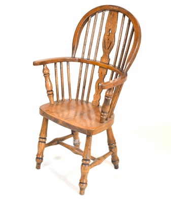 Lot 90 - A children's oak stick back Windsor chair,...