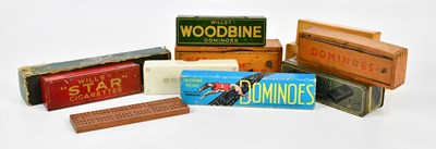 Lot 568 - A collection of vintage dominoes including...