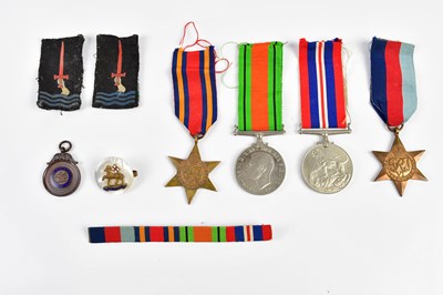 Lot 2597 - A WWII four piece medal group comprising the...