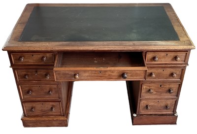 Lot 22 - A Victorian mahogany pedestal desk with black...