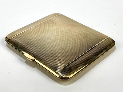 Lot 24 - A 9ct yellow gold cigarette case with engine...