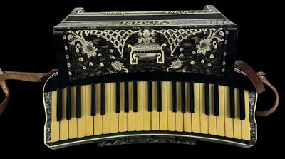 Lot 451 - CASALI III; a cased Italian piano accordion.