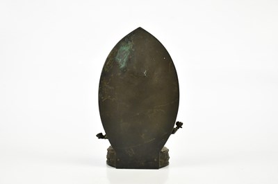 Lot 1172 - A Chinese bronze figure of a female deity with...