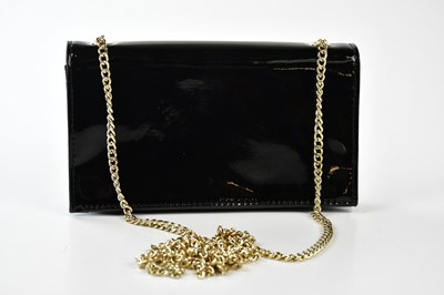 Lot 783 - VERSACE JEANS; a black patent leather clutch...
