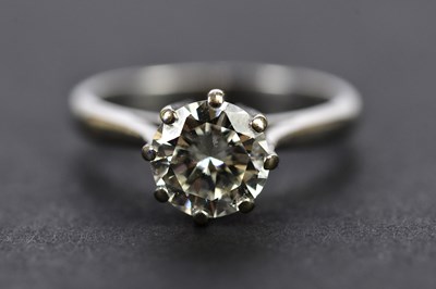 Lot 31 - An 18ct white gold diamond solitaire ring, the...