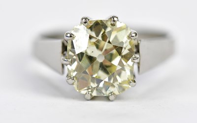 Lot 23 - A white metal diamond solitaire ring, the claw...