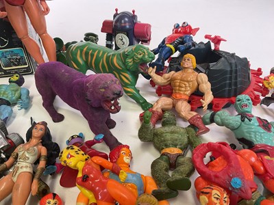 Lot 324 - A box of action figure toys, to include He-Man,...