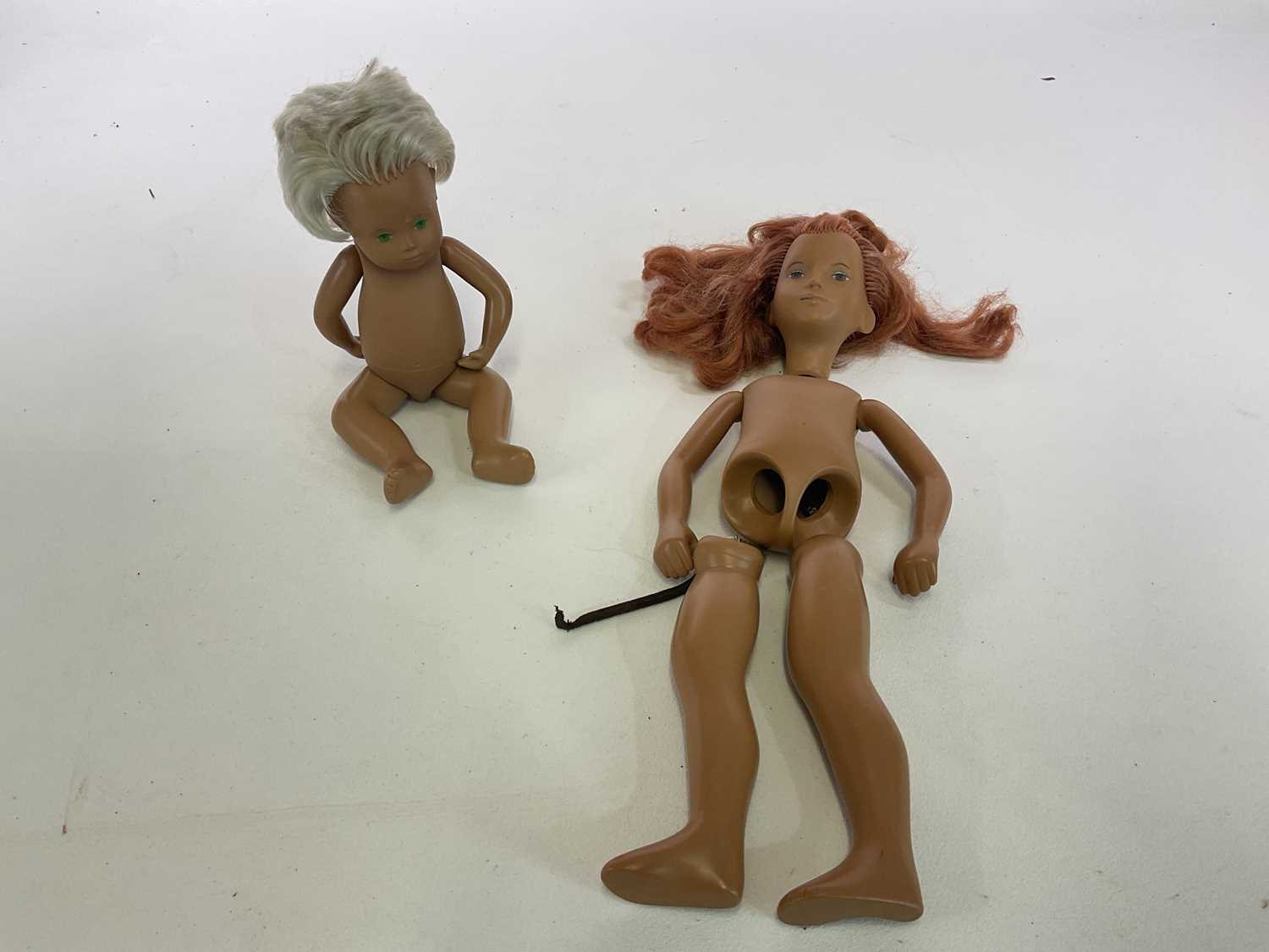 Lot 327 - SASHA DOLLS; a Sasha doll, height 40cm, in...