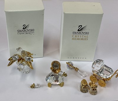 Lot 146 - SWAROVSKI; two boxed Crystal Memories - a vase...