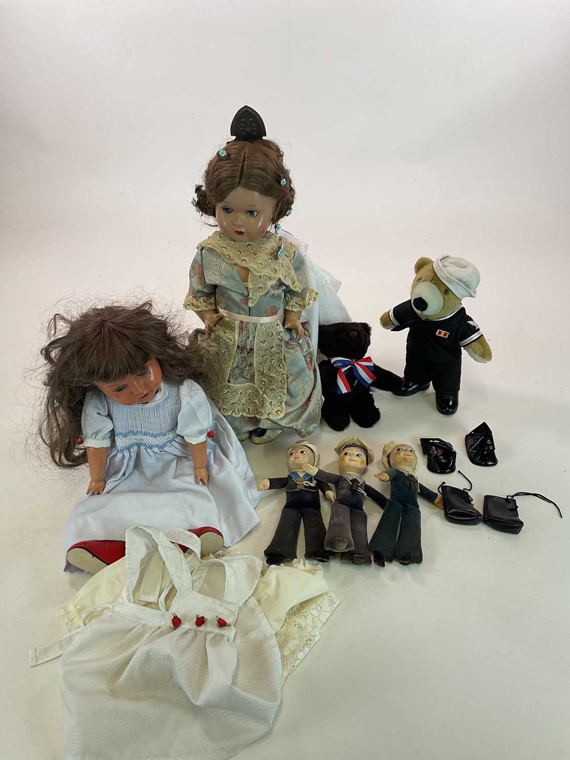 Lot 380 - DOLLS AND TEDDIES; a group comprising a small...