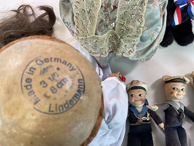 Lot 380 - DOLLS AND TEDDIES; a group comprising a small...