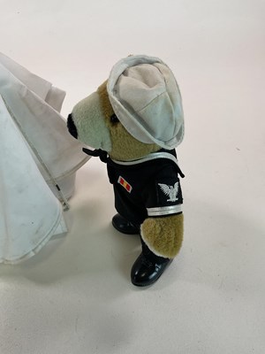 Lot 380 - DOLLS AND TEDDIES; a group comprising a small...