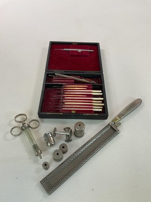 Lot 94 - A small group of medical items, including a...