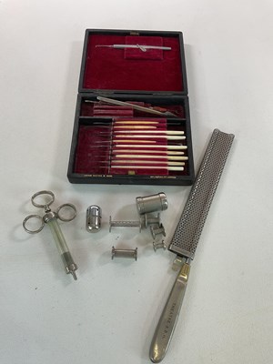 Lot 94 - A small group of medical items, including a...