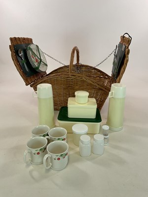 Lot 97 - A 1950s wicker picnic basket with contents.