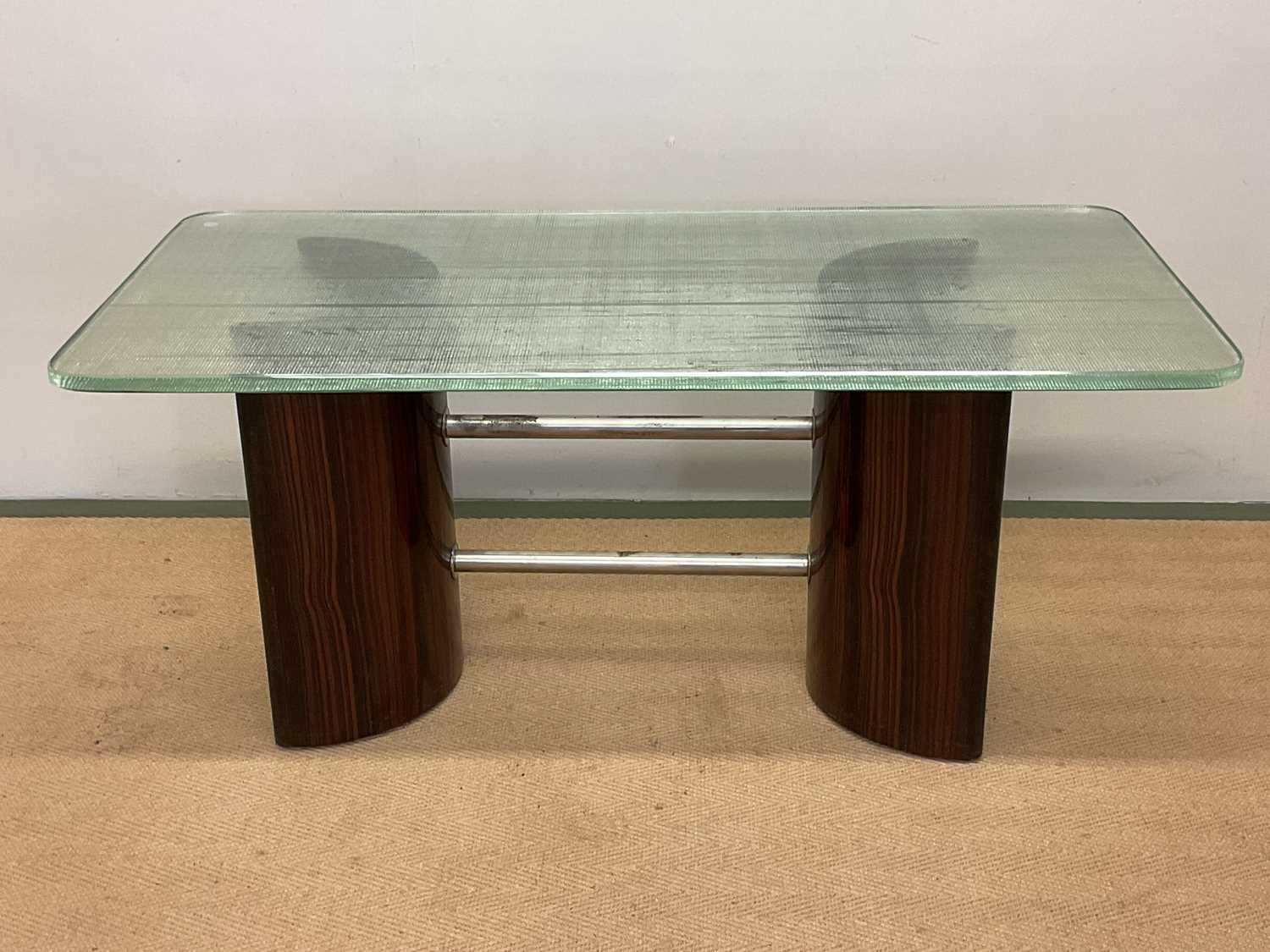 Lot 627 - A mid 20th century Danish zebra wood and glass...