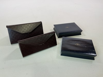 Lot 225 - Two Gucci glasses cases and two...