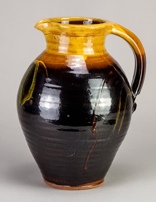 Lot 153 - CLIVE BOWEN (born 1943); a slipware jug with...