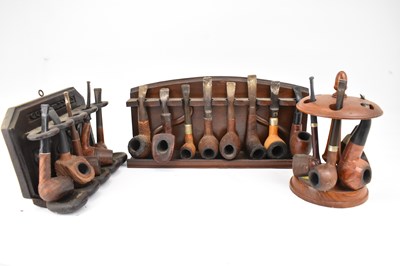 Lot 236 - Three pipe racks and seventeen various pipes.