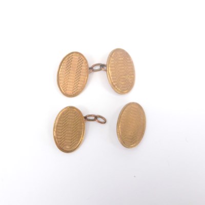 Lot 803 - A pair of vintage 9ct gold oval cufflinks with...