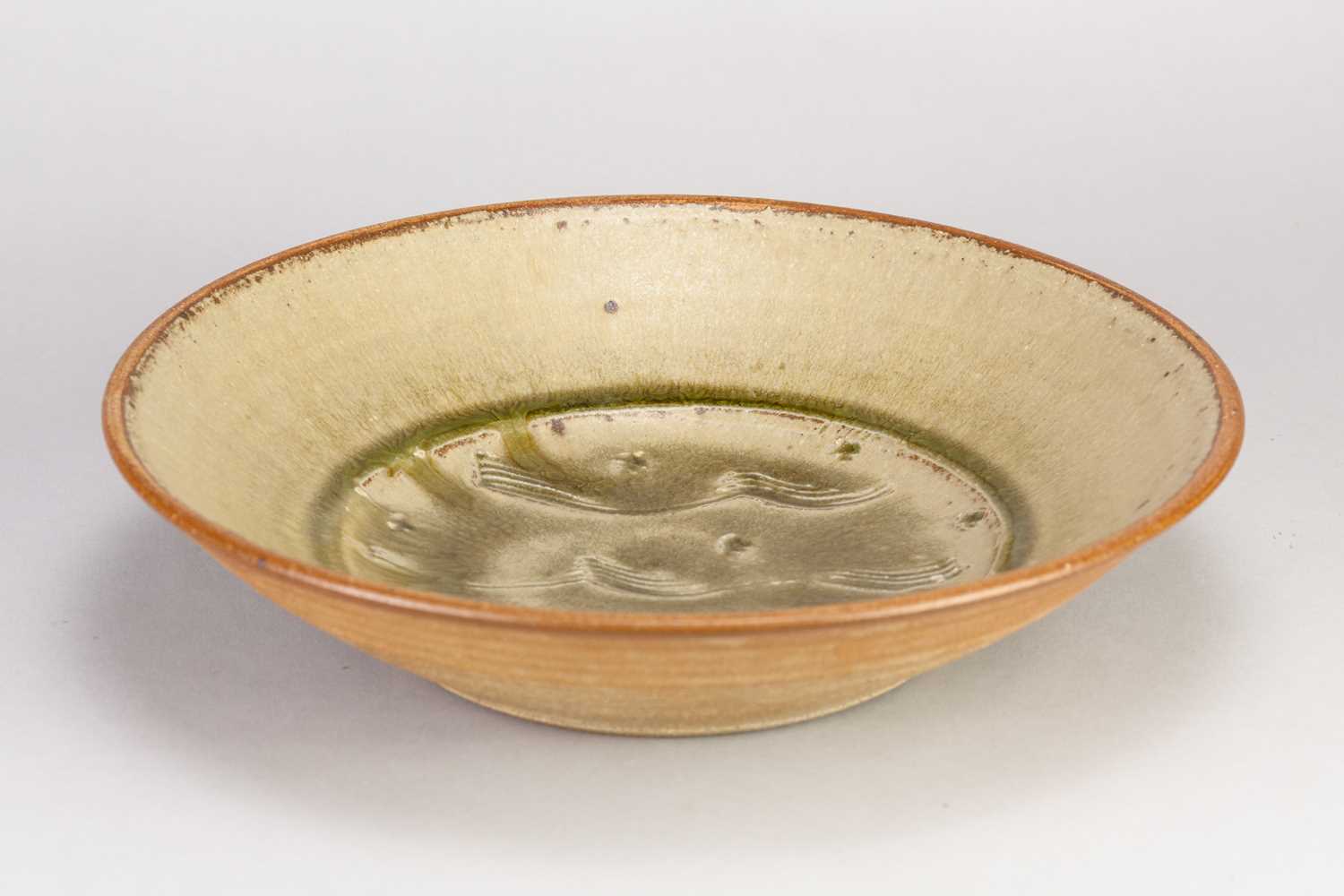 Lot 599 - PHIL ROGERS (1951-2020); a stoneware dish...